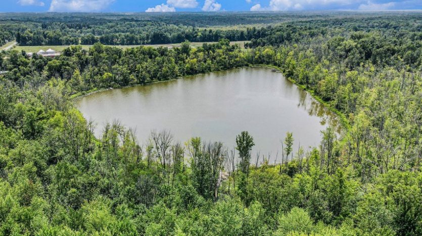 Paw Paw MI home with acreage and lake frontage