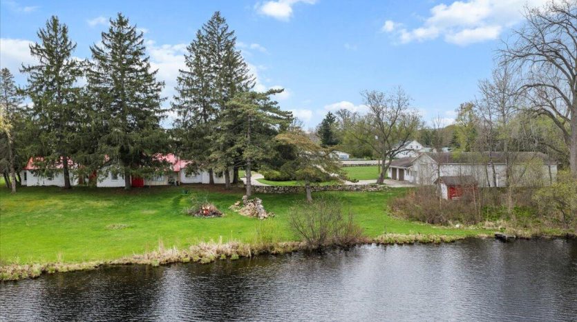rural home with acreage and pond