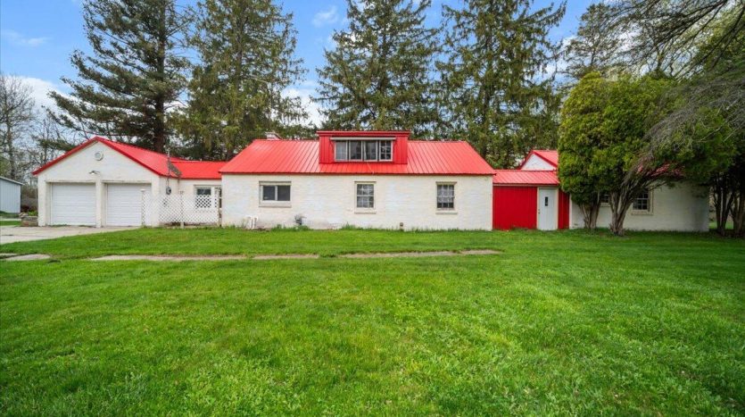country house on lake with 11 acres in Vestaburg MI on Cedar Lake